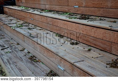 Gray Monolithic Concrete Park Bench Made Of Concrete In The Shape Of Round Stones Wooden Staircase B