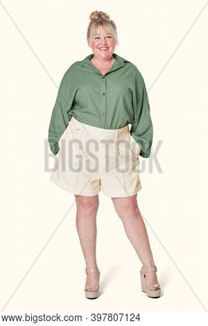Size inclusive women's fashion green shirt studio shot