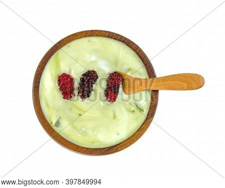 Yoghurt Mix Green Tea Flavor Powder With Nata De Coco Dutchie And Mulberries Fruit In Wooden Bowl Is