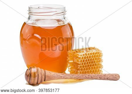 Glass Jar Full Of Honey, Honeycomb Piece And Wooden Dipper Isolated On White Background. Space For T