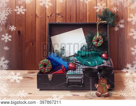 Old Suitcase With Christmas Presents, Gingerbreads Cookie In Shape Of Christmas Wreath And Woolen Sw