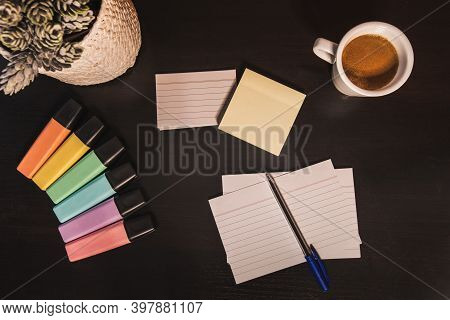 Desk With Notes And Pen To Write With Colored Markers