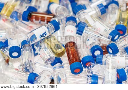 Dirty Used Chromatographic Vials With Blue Caps. Hplc Analysis At Analytical Chemistry Laboratory. D