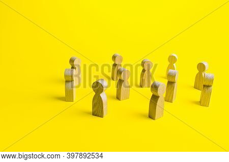 Figures Of People Stand Randomly On A Yellow Background. People Society Concept. Behavior And Social