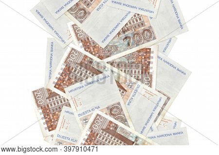 200 Croatian Kuna Bills Flying Down Isolated On White. Many Banknotes Falling With White Copyspace O