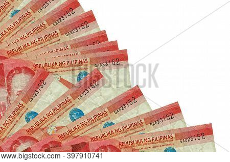 50 Philippine Piso Bills Lies Isolated On White Background With Copy Space Stacked In Fan Close Up