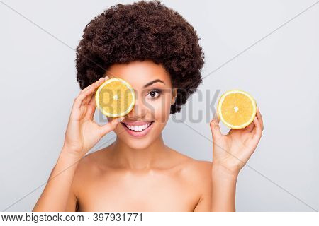 Close-up Portrait Of Nice Attractive Cheerful Healthy Wavy-haired Girl Holding In Hand Orange Pieces