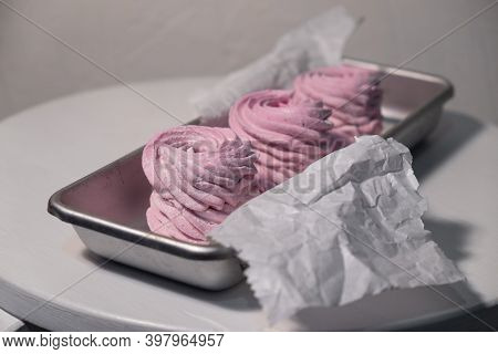 Pink Strawberry Homemade Zephyr Or Marshmallow In A Rectangular Oleum Plate. Side View, Close-up, Se