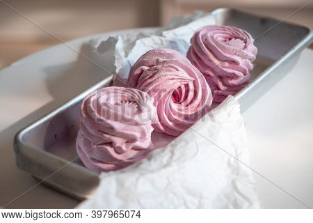 Pink Strawberry Homemade Zephyr Or Marshmallow In A Rectangular Oleum Plate. Side View, Close-up, Se
