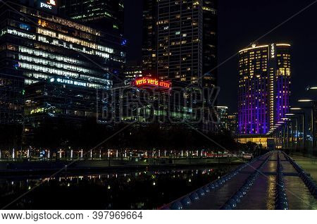 Melbourne, Australia - May 17, 2019: Night View Of The Melbourne Skyline Along The Yarra River On Fl