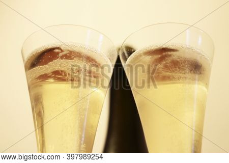Bottle Of Champagne And A Pair Glasses Before Drinking