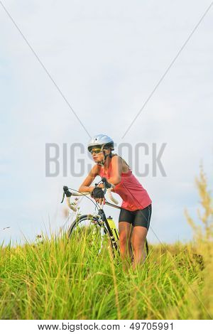 Nice Portrait Of A Young Female Sport Athlete Resting Outsie.