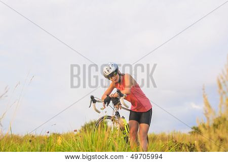 Nice Portrait Of A Young Female Sport Athlete Resting Outsie.