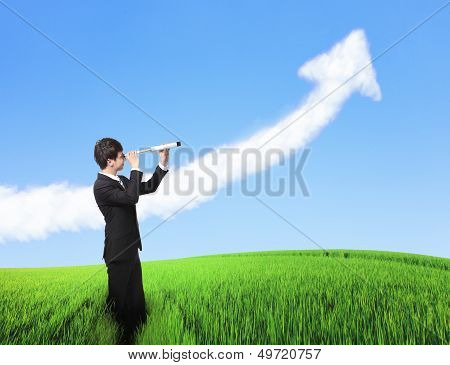 Business Man Looks Through Telescope