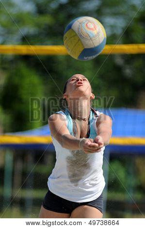 KAPOSVAR, HUNGARY - AUGUST 4: Kinga Fath in action at a ROAK Viragfurdo Kupa beach volleyball competition, August 4, 2013 in Kaposvar, Hungary.