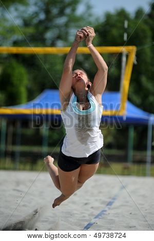 KAPOSVAR, HUNGARY - AUGUST 4: Kinga Fath in action at a ROAK Viragfurdo Kupa beach volleyball competition, August 4, 2013 in Kaposvar, Hungary.