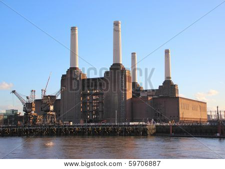 Old Coal Power Plant With Chimenys At Waterfront