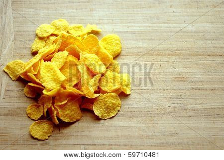 Cornflakes On Wood Cutboard