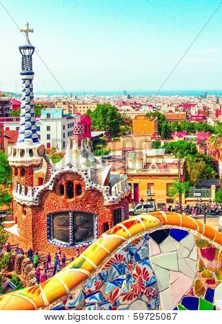 BARCELONA, SPAIN - JULY 19: Ceramic mosaic Park Guell on July 19, 2013 in Barcelona, Spain. Park Guell is the famous architectural town art designed by Antoni Gaudi and built in the years 1900 to 1914