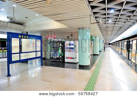 SHANGHAI, CHINA - MAY 27: Shanghai subway station interior on May 27, 2012 in Shanghai, China. The Shanghai Metro system has 11 lines, 278 stations and is the longest and 5th busiest in the world.