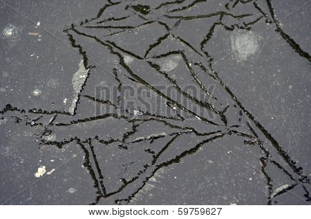 Irregular pattern of ice structure on the pond . Near Kiev,Ukraine