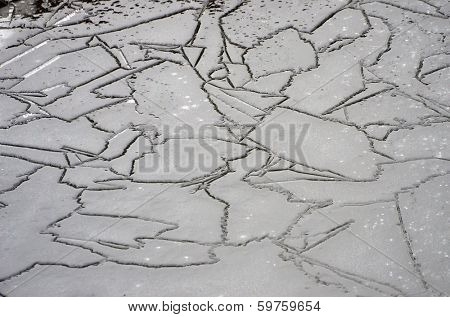 Irregular pattern of ice structure on the pond . Near Kiev,Ukraine