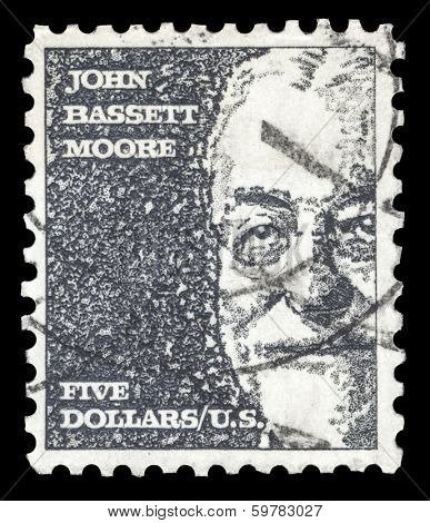 USA-CIRCA 1966: A postage stamp shows image portrait of John Bassett Moore a famous American judge and the first US judge to serve on the Permanent Court of International Justice, circa 1966.