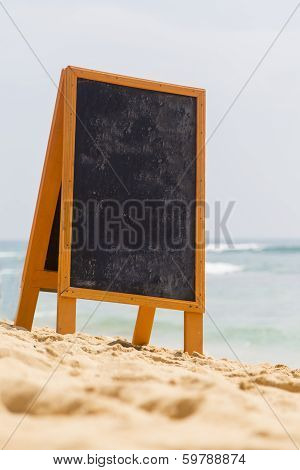 Blank Board On The Beach