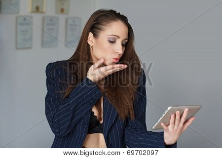 Brunette Secretary Sending Kisses