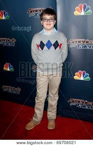 NEW YORK-AUG 6: Pianist Adrian Romoff attends the 'America's Got Talent' post show red carpet at Radio City Music Hall on August 6, 2014 in New York City.