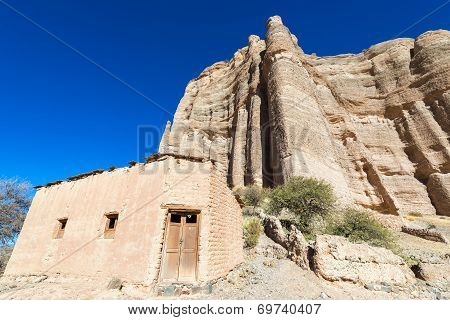 Adobe Building And Cliff