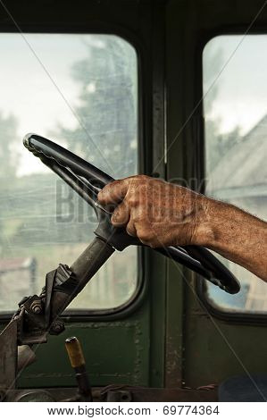 Hand On A Steering Wheel