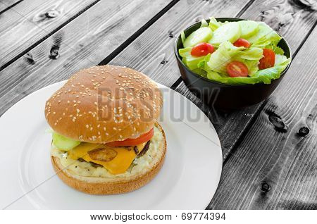 Cheeseburger With Bacon And Tartar Sauce And Garden Salad