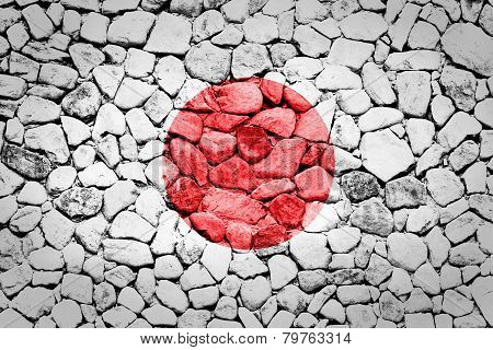 japan flag painted on a stone wall