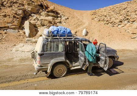  BOLIVIA, MAY 16, 2014: tourists visit the Sur Lipez desert during a SUV tour