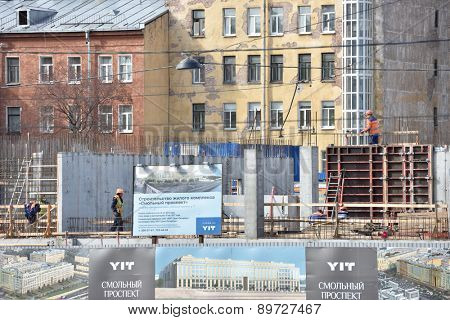 ST. PETERSBURG, RUSSIA - APRIL 27, 2015: Construction site of a residential structure built by Finnish company YIT Corporation. The company is the most significant foreign housing developer in Russia
