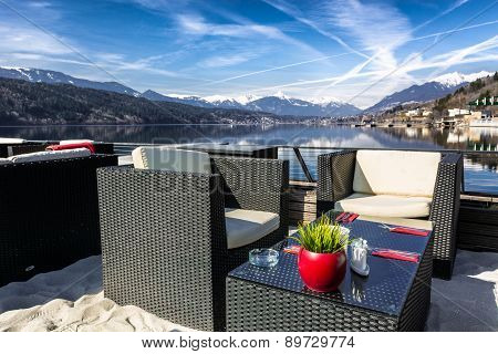 Lakeside bar with a mountain view