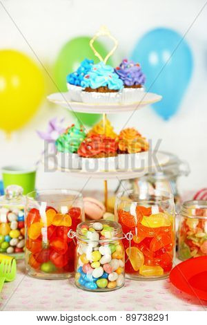 Prepared birthday table with sweets for children party