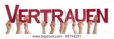 People Holding Straight Word Vertrauen Means Trust