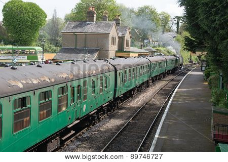 Vintage steam train waits to depart the station
