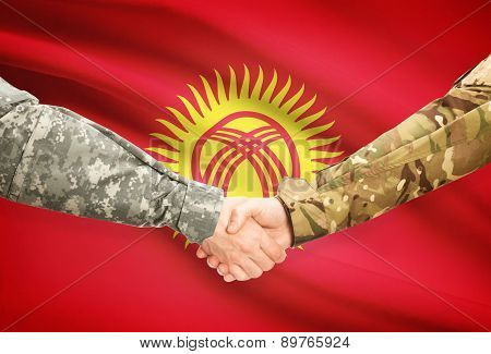 Men In Uniform Shaking Hands With Flag On Background - Kyrgyzstan