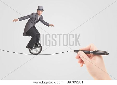 Businessman riding monocycle on a rope drawn by hand concept