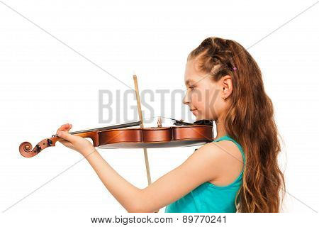 Half-face of girl with long hair playing violin