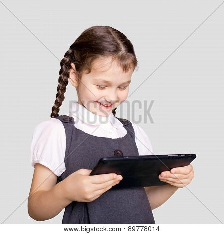 Little Student Girl Using Tablet Pc