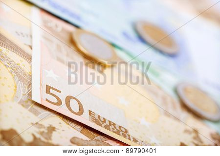 Closeup Of Euro Banknotes And Coins