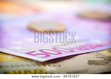 Closeup Of Euro Banknotes And Coins