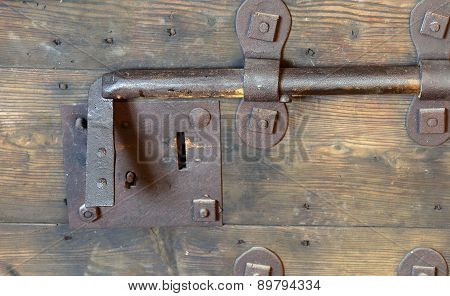 Rusty Lock With Deadbolt To Close The Door Of The Medieval Castle
