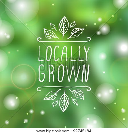 Locally grown - product label on  blurred background.