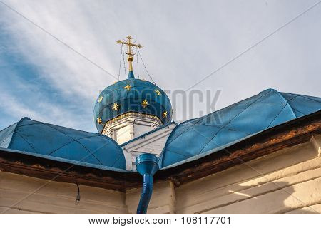 Blue dome with a yellow cross