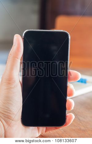 Smart Phone In A Woman's Hand